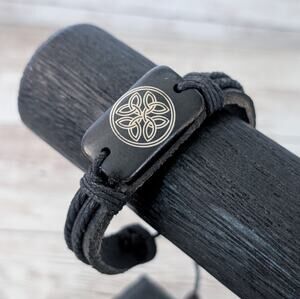 Leather? Tie Bracelet with Celtic Like Charm